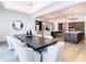 Dining area showcases a large table, elegant chairs, and flows seamlessly to the gourmet kitchen, perfect for entertaining at 4816 W San Jose St, Tampa, FL 33629