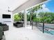 The covered patio is perfect for entertaining, offering comfortable seating and a view of the refreshing pool at 4816 W San Jose St, Tampa, FL 33629
