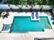 Enjoy the refreshing pool, accompanied by lounge chairs and lush landscaping at 4816 W San Jose St, Tampa, FL 33629