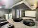 Spacious home theater boasts comfortable seating, large screen, and ambient lighting, designed for ultimate viewing pleasure at 4816 W San Jose St, Tampa, FL 33629