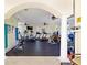 This is a great view of the gym in the community clubhouse at 4981 Bacopa S Ln # 103, St Petersburg, FL 33715