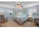 Tranquil bedroom featuring shuttered windows and neutral colored walls at 5000 Gulf Blvd # 304, St Pete Beach, FL 33706