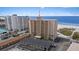 High-rise building with beach views, a private pool, and on-site parking at 5000 Gulf Blvd # 304, St Pete Beach, FL 33706