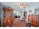 Inviting dining area open to the living room with ceiling fan at 5000 Gulf Blvd # 304, St Pete Beach, FL 33706
