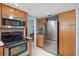 Modern kitchen with stainless steel appliances and ample cabinet storage at 5000 Gulf Blvd # 304, St Pete Beach, FL 33706