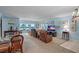 Bright living room featuring beach views, comfortable seating, and stylish decor at 5000 Gulf Blvd # 304, St Pete Beach, FL 33706