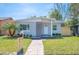 Charming single-story home featuring a well-maintained lawn, modern mailbox, and a welcoming front entrance at 5050 Emerson S Ave, St Petersburg, FL 33707