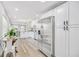 Modern kitchen featuring stainless steel appliances, granite countertops, and ample cabinet space at 5050 Emerson S Ave, St Petersburg, FL 33707