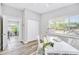 Well-lit office space with neutral walls, wood-look floors, closet, and view at 5050 Emerson S Ave, St Petersburg, FL 33707