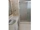 Full bath featuring a shower and fish-themed wallpaper at 5108 Brittany S Dr # 903, St Petersburg, FL 33715