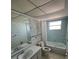 Full bathroom with a shower and tub combination and decorative wall paper at 5108 Brittany S Dr # 903, St Petersburg, FL 33715