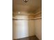 A walk-in closet with shelving space and a hanging rod at 5108 Brittany S Dr # 903, St Petersburg, FL 33715