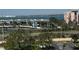 View of water, condos, a pond, parking lot and landscaping at 5108 Brittany S Dr # 903, St Petersburg, FL 33715