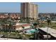 An aerial shot of a condo with a pool and palm trees at 5108 Brittany S Dr # 903, St Petersburg, FL 33715