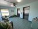 Elevators featuring stainless steel doors, tiled floor, and lobby seating area at 5108 Brittany S Dr # 903, St Petersburg, FL 33715