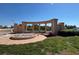Inviting entrance with decorative columns and water feature leading to waterfront views at 5108 Brittany S Dr # 903, St Petersburg, FL 33715