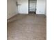 Empty living room with a door to the exterior at 5108 Brittany S Dr # 903, St Petersburg, FL 33715