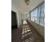 Living room featuring neutral paint, carpet, and beautiful bay views at 5108 Brittany S Dr # 903, St Petersburg, FL 33715