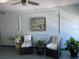 Cozy lobby with seating, artwork, plants, and decorative touches at 5108 Brittany S Dr # 903, St Petersburg, FL 33715