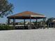 Outdoor pavilion with picnic tables, perfect for gatherings and enjoying the surrounding nature at 5108 Brittany S Dr # 903, St Petersburg, FL 33715