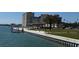 Scenic waterfront with a gazebo, dock, and park, set against a backdrop of residential buildings at 5108 Brittany S Dr # 903, St Petersburg, FL 33715