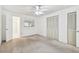 Bedroom with large closet is bright and well-lit from a large window at 6645 1St N Ave # 107, St Petersburg, FL 33710