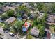 Birds eye view of a residential area featuring tree-lined streets and tidy single-Gathering homes at 8308 N Mulberry St, Tampa, FL 33604