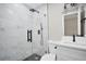 Modern bathroom featuring a glass shower, sleek fixtures, and a stylish vanity at 8308 N Mulberry St, Tampa, FL 33604