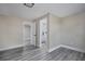 Cozy bedroom with a view into a modern bathroom and ample closet space at 8308 N Mulberry St, Tampa, FL 33604