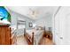 Bedroom features wood floors, light blue walls, and white ceiling fan at 8436 White Poplar Dr, Riverview, FL 33578