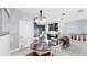 Charming eat-in kitchen with stainless steel appliances, dark wood cabinetry, and counter seating at 8436 White Poplar Dr, Riverview, FL 33578