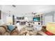 Expansive open-concept living space with kitchen, living room, and dining area, perfect for entertaining at 8436 White Poplar Dr, Riverview, FL 33578