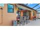 Charming outdoor bar area with a tiki-style roof, ideal for entertaining guests by the pool at 8436 White Poplar Dr, Riverview, FL 33578