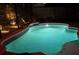 Sparkling swimming pool featuring unique lighting with a custom design at 8436 White Poplar Dr, Riverview, FL 33578