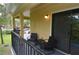 A cozy balcony featuring outdoor seating perfect for relaxation and enjoyment at 8642 Mallard Reserve Dr # 203, Tampa, FL 33614
