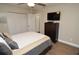 Cozy bedroom providing storage bed frame, closet, and modern ceiling fan at 8642 Mallard Reserve Dr # 203, Tampa, FL 33614