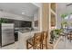 Modern kitchen with stainless steel appliances and granite countertops at 8642 Mallard Reserve Dr # 203, Tampa, FL 33614