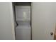 Convenient stacked washer and dryer in a dedicated laundry closet; great for saving space at 8642 Mallard Reserve Dr # 203, Tampa, FL 33614
