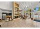 Spacious living room with fireplace and views of pool at 8642 Mallard Reserve Dr # 203, Tampa, FL 33614