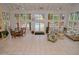 Bright living room with tile flooring and ample seating at 8642 Mallard Reserve Dr # 203, Tampa, FL 33614