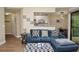 Living room showcasing an open layout with access to the kitchen and dining area, and a large comfortable couch at 8642 Mallard Reserve Dr # 203, Tampa, FL 33614