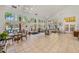 Open living room with views of pool at 8642 Mallard Reserve Dr # 203, Tampa, FL 33614