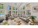 Comfortable living room with natural lighting and cozy decor at 8642 Mallard Reserve Dr # 203, Tampa, FL 33614