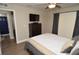Bedroom view showing access to the bathroom and featuring hardwood floors at 8642 Mallard Reserve Dr # 203, Tampa, FL 33614