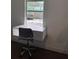 Efficient, modern desk setup with great lighting and outside view at 907 Fruitland Ave, Bradenton, FL 34207