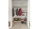Walk-in closet with shelving ready for renovation at 100 Buena Vista S Dr, Dunedin, FL 34698