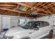 Garage featuring car and storage at 100 Buena Vista S Dr, Dunedin, FL 34698