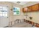 Kitchen with cabinets and backsplash ready for renovation at 100 Buena Vista S Dr, Dunedin, FL 34698