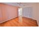 Bedroom featuring hardwood floors, ceiling fan, closet and neutral walls at 11218 Longbrooke Dr, Riverview, FL 33579