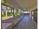 Long covered, screened-in patio for outdoor living at 11218 Longbrooke Dr, Riverview, FL 33579